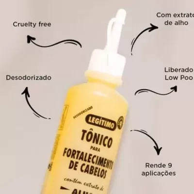 Frasco amarelo de tónico para fortalecimento de cabelos com tampa branca e texto em preto.