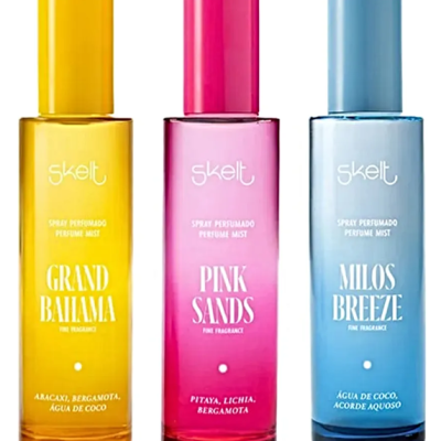 Três frascos coloridos de perfume spray Skelt com nomes e fragrâncias visíveis