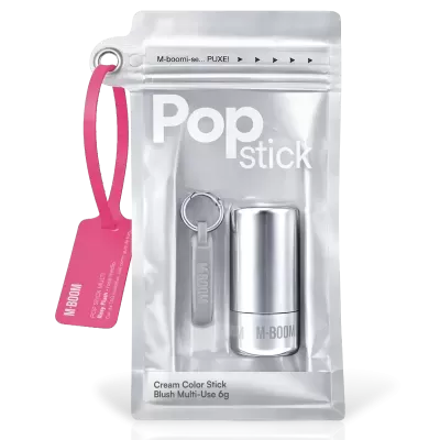 Pack de maquilhagem com stick prateado e acessório em embalagem plástica transparente e tag rosa