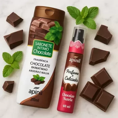Dois produtos Apinil com fragrância de chocolate, rodeados por pedaços de chocolate e folhas de hortelã.