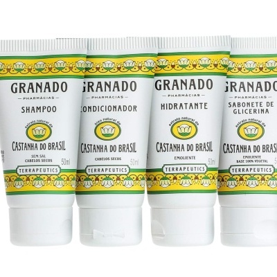Conjunto de quatro tubos de produtos de cuidado pessoal Granado com embalagem branca e etiqueta decorativa amarela e verde.