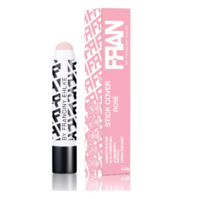 Stick de cobertura com embalagem rosa e branca com padrão gráfico e texto visível