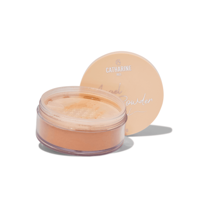 Pó solto para rosto CATHARINE HILL Angel Powder com embalagem transparente e tampa bege.