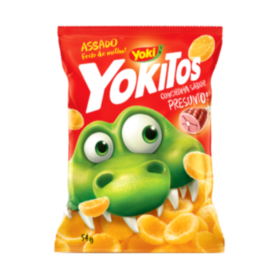 Pacote vermelho de snacks Yokitos com crocodilo verde e texto em português.
