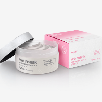 Máscara facial branca we mask com embalagem branca e rosa e tampa prateada aberta