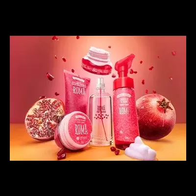 Produtos cosméticos romã AVRIL com romãs e sementes em fundo vermelho