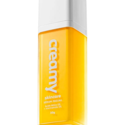 Frasco amarelo de sérum facial com tampa branca e texto 