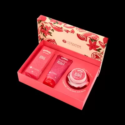 Conjunto de cosméticos LOccitane au Brésil, edição Romã, com três produtos em caixa vermelha decorada