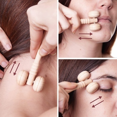 Massajador de madeira com duas rodas usado no rosto e pescoço