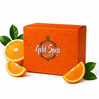 Caixa de embalagem laranja Gold Spell com laranjas frescas e folhas verdes