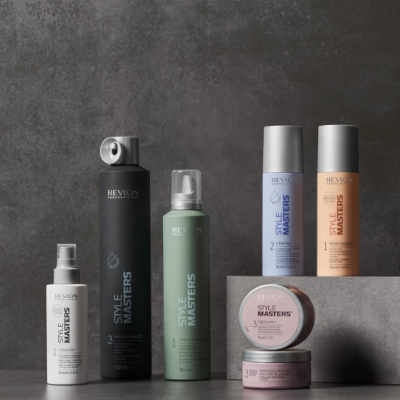 Produtos REVLON STYLE MASTERS em várias embalagens coloridas sobre fundo cinzento