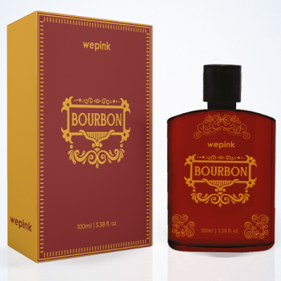 Frasco de perfume vermelho com texto dourado e embalagem caixa correspondente