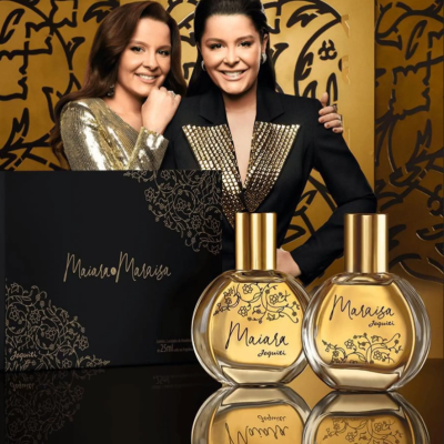 Conjunto de perfumes Maiara e Maraisa Jequiti com frascos e caixa preta decorada.