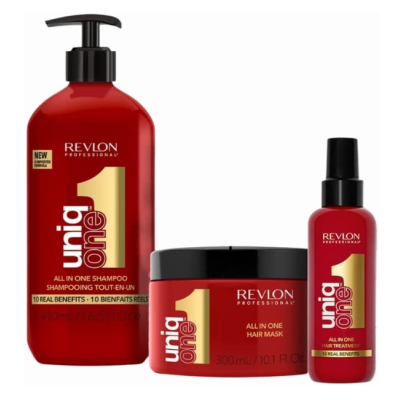 Produtos de cuidado capilar REVLON uniq one em embalagens vermelhas com texto dourado e branco