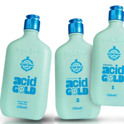 Frascos azuis claros de produtos para cabelo acid GOLD