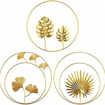 Decorações de parede redondas douradas com folhas metálicas estilizadas