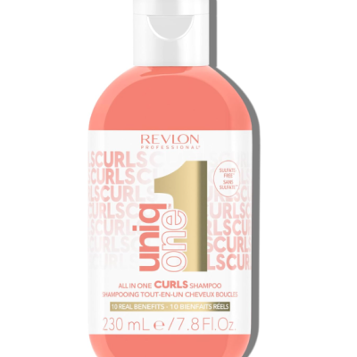 Frasco de shampoo Uniq One All in One Curls da Revlon cor-de-rosa com tampa branca