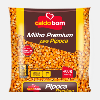 Pacote de milho para pipoca Caldo Bom com texto e grãos visíveis