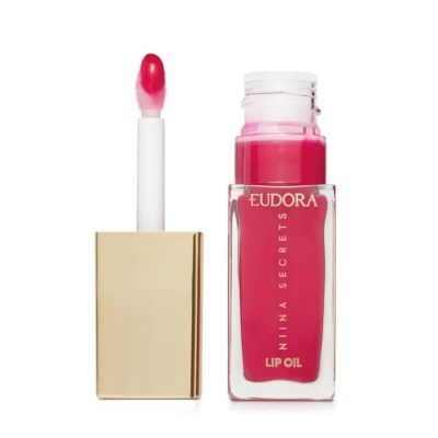 Frasco de oleo labial rosa com aplicador e tampa dourada