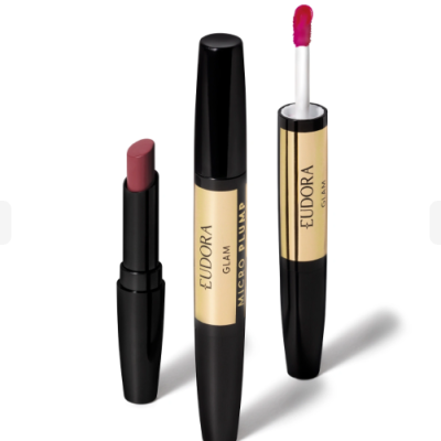 Produtos de maquilhagem Eudora com baton, gloss labial e aplicador em preto e dourado