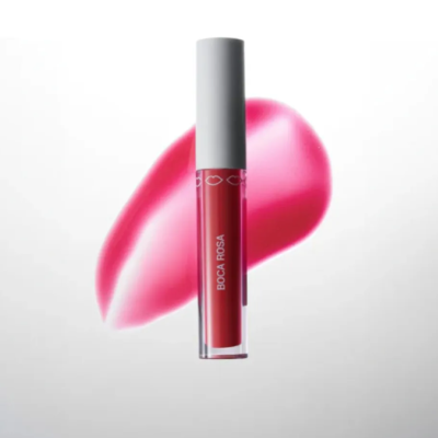 Batom líquido rosa em embalagem transparente com tampa cinzenta