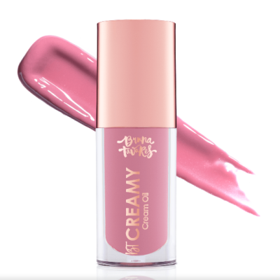 Verniz de unhas rosa creme com tampa rosa claro e texto dourado