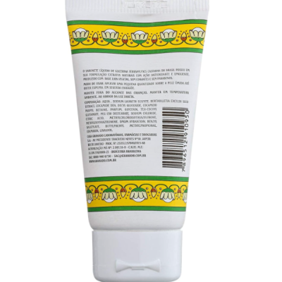 Tubo branco com tampa branca e etiqueta amarela e verde com padrão floral e texto em português