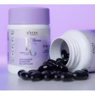 Frascos de suplemento alimentar YBERA com cápsulas pretas e fundo lilás