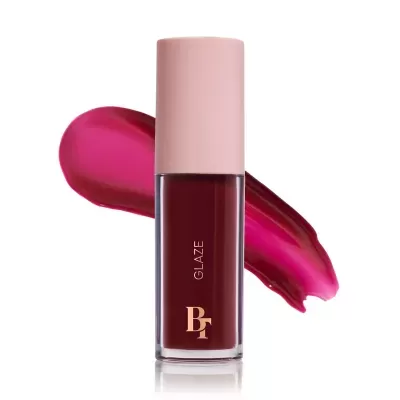 Frasco de verniz para unhas vermelho escuro com tampa rosa clara e fundo branco
