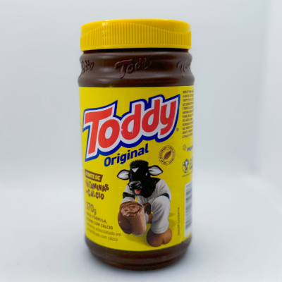 Frasco Toddy Original amarelo com vaca e texto
