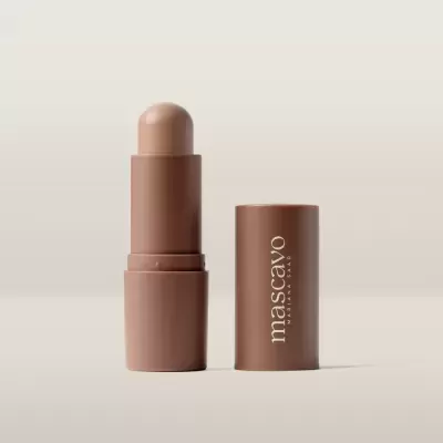 Baton bege com embalagem marrom e texto mascavo MARIANA SAAD