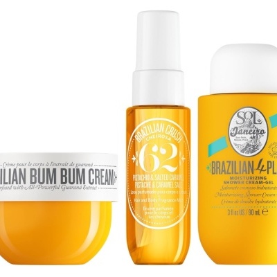 Três produtos de cuidados pessoais amarelos e brancos da Sol de Janeiro