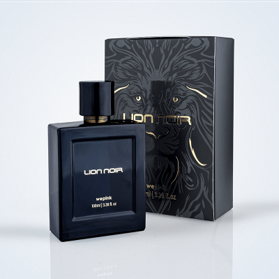Perfume LION NOIR em frasco e caixa preta com estampa de leão