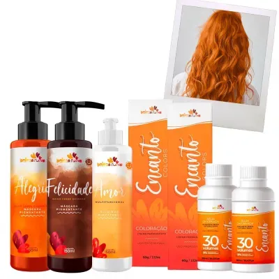 Produtos de coloração de cabelo da marca beleza ruiva com embalagem nas cores laranja, branco e marrom, e foto de cabelo ruivo atrás.
