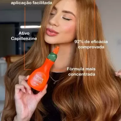 Mulher com cabelo comprido castanho claro segura produto capilar com descrições ao redor