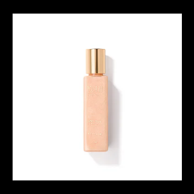 Frasco retangular rosa salmão com tampa dourada de óleo para rosto em fundo branco