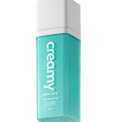 Frasco de produto creamy skincare azul com tampa branca e texto branco