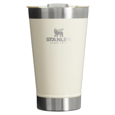 Copo térmico Stanley em creme com detalhes prateados e texto cinza