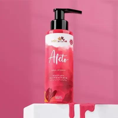 Frasco de máscara pigmentante rosa intenso com válvula preta e rótulo vermelho e branco