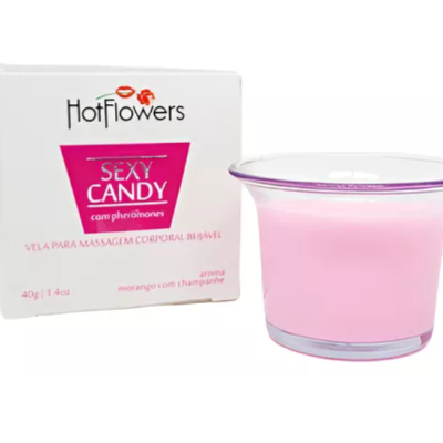Vela para massagem corporal Hot Flowers Sexy Candy em embalagem branca com vela cor de rosa em vidro.