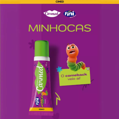 Tubo roxo e verde com texto Carmed e minhoca animada e texto promocional