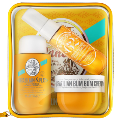 Conjunto de produtos de cuidados para a pele amarelados em embalagem transparente