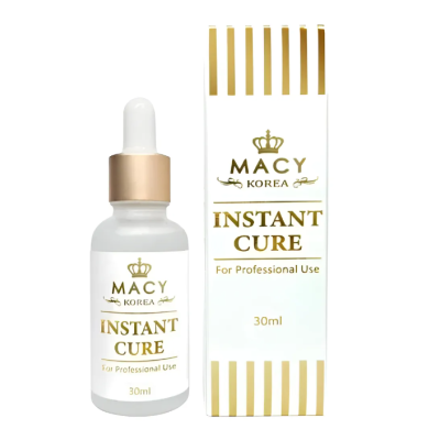 Frasco e caixa do produto MACY KOREA Instant Cure em branco e dourado