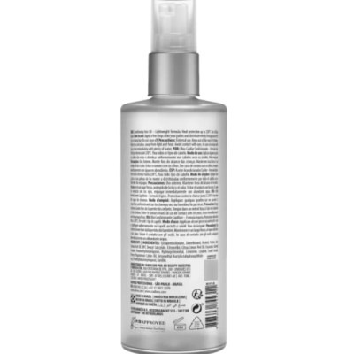 frasco prateado de spray com tampa transparente e texto impresso na parte traseira