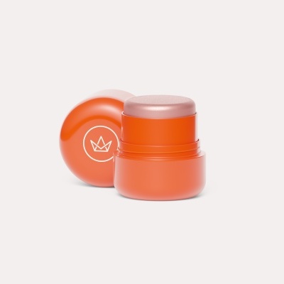 Frasco laranja de creme com tampa e logotipo de coroa