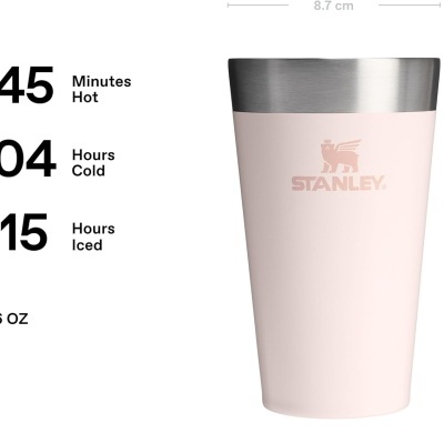 Copo térmico rosa claro com detalhe de aço escovado e logo STANLEY