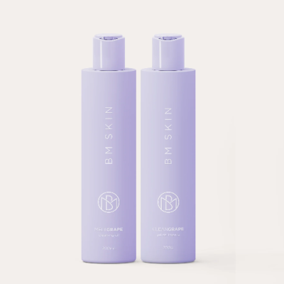 Dois frascos de produto lilás BM SKIN com texto PHILGRAPE e CLEANGRAPE.