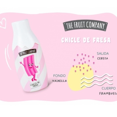 Embalagem branca com rótulo rosa e personagem de chicle rosa, texto THE FRUIT COMPANY e descrições de sabores em espanhol