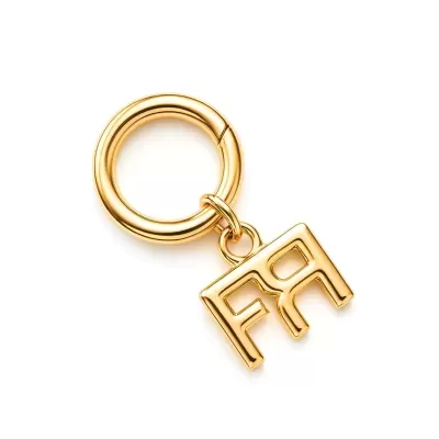 Porta-chaves dourado com anel circular e pendente com letras FR