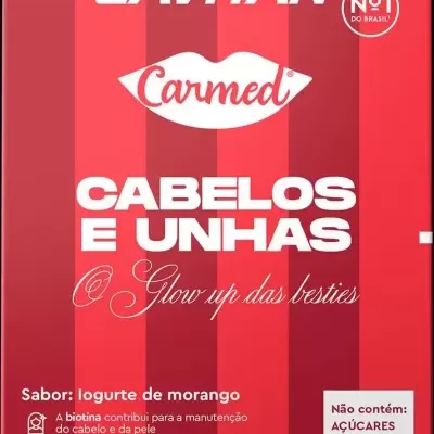 Embalagem vermelha e amarela de suplemento LAVITAN Carmed para cabelo e unhas com texto em português